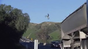 Police investigate after daredevil jumps over busy freeway on motorcycle