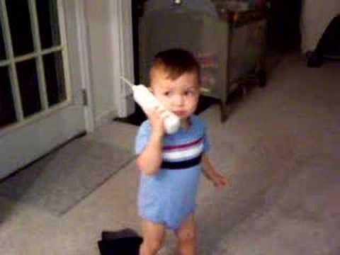 Baby Troy imitating Mommy and Daddy on phone