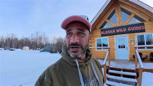 Snowmobiling & meeting hero dogs at a veterans PTSD charity in Alaska