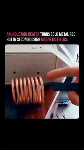 Syntral AI on Instagram: "An induction heater turns cold metal red hot in seconds using magnetic fields. No flame, no contact—just pure electromagnetism. A high-frequency AC current flows through a copper coil, creating a rapidly changing magnetic field that induces eddy currents inside the metal. Those currents generate intense heat from within the workpiece itself, turning steel cherry-red in 5–10 seconds while the coil stays cool. It’s why induction heating dominates forging, hardening, brazi