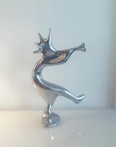 Kokopelli Polished Aluminum Sculpture by Hozelton. - Etsy