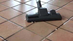 clip-4537796-woman-vacuuming-floor