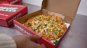 More pizza places across Canada are now offering Indian-style pizzas — but Brampton has to be selling the most. For decades, the city’s South Asian community has been calling up local chains and ordering "Indian-style" pizza, featuring toppings like garlic, coriander, ginger and green chilis. That success has led to even more Indian toppings (hello, butter chicken) being thrown on. Nav Nanwa looked into how the pizza came to be. Read more: https://www.cbc.ca/1.6385662 | CBC Toronto