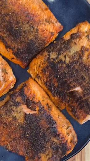 Smoky Cajun crust. Juicy salmon inside. Done in 15 minutes. This blackened salmon is your answer to a quick, easy, flavorful dinner tonight! Comment ‘save’ and I’ll DM you the recipe, or you can find it on my website, COOKtheSTORY. #makeittonight #easyrecipe #blackenedsalmon #salmon #seafood https://cookthestory.com/blackened-salmon/ | Cook the Story
