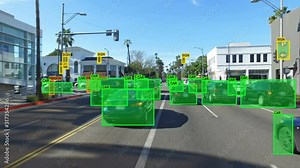 Autonomous car driving through Los Angeles. Computer vision. Object detection system that creates boxes to recognize objects in the streets. Artificial intelligence technology.