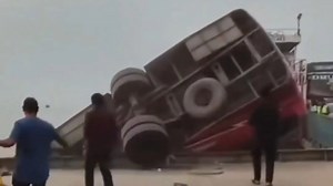 Terrifying moment packed bus plunges into river as 16 bodies pulled from wreck