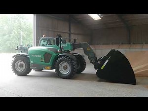 Kramer KT 407 telescopic loader pushing up Wheat in Norfolk