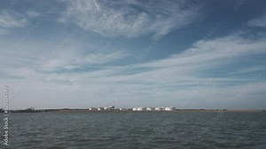 Chemical manufacturing plant next to a canal