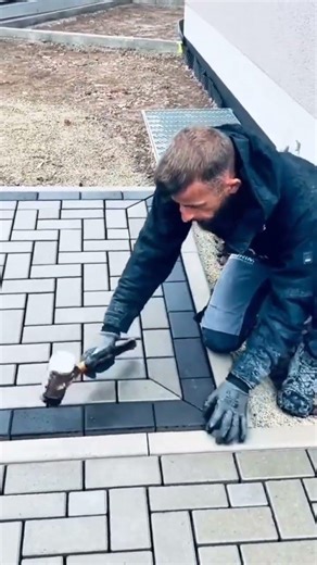 Compacting the soil to make paving block installation easier, ensuring a firm and stable base #viral