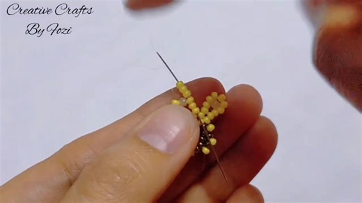 4.2K views · 50 reactions |  Bracelet but make it bloom! Turn your wrist into a mini garden with this DIY Daisy Flower Bracelet tutorial Watch, craft, and tag your daisy squad!  #diyjewelry #daisybracelet #BeadworkMagic #fbreels #trendingnow #WatchThis #ReelsDaily #MustSee #ViralContent #ForYouOnFacebook #CreativeShots #HandmadeWithLove #JewelryTutorial #CraftyVibes #ComfortCrafts | Creative Crafts By Fozi | Facebook