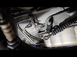 Repairing a Chevy shift linkage.