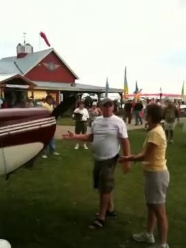 Hand start a prop airplane