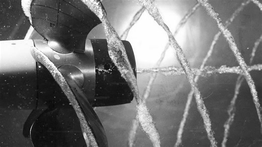 Bubble-powered robots: How collapsing cavities could replace needles