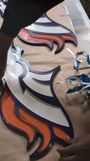 Oramask removal after painting CNC Denver Broncos sign #colorado#cnc #denverbroncos