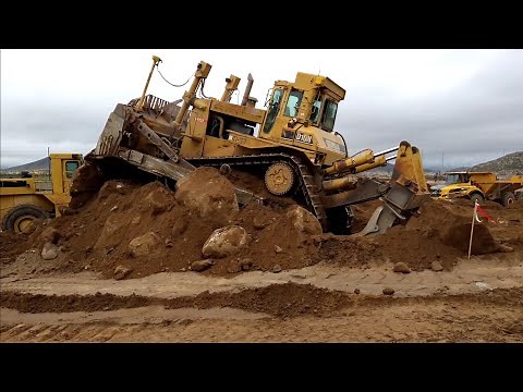 CAT D10N Dozer pushing dirt and rock - amazing power