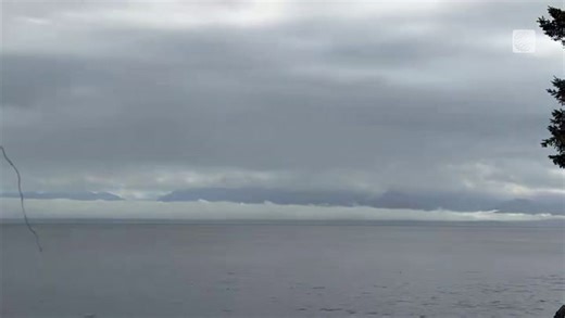 Timelapse in BC shows the movement of clouds over the water