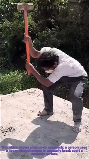 Manual Concrete Demolition: Breaking Down with a Sledgehammer