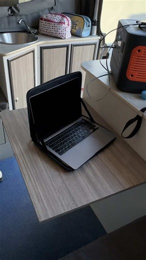 Inside the Conqueror… it’s surprisingly spacious 🐺 @dieterpey Storage everywhere, with cubbies on the side, pass-through lockers you can access from inside and outside, and even a hidden cabinet behind the seat. There’s a second basin with hot and cold water, a 150L water tank with battery and level monitoring, and a small fold-out table where I’ve actually been able to sit and get some work done. One seat doubles as a spot for a porta-loo (though I might turn it into a dustbin instead), while 