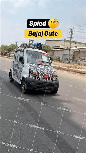 Is this the new Bajaj Qute? Caught in traffic!