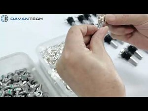 Overmolded grounding pin with plastic nut