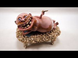 I made the Tooth Fairy sitting on a sofa made of teeth