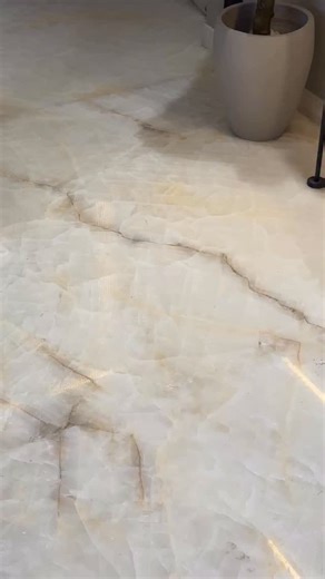 This is onyx marble—luxury that feels light. The book-match pattern flows effortlessly, adding depth without overpowering the space. It makes the home feel open, inviting, and thoughtfully designed. A subtle statement that quietly sets the home apart. | Architect Sambhav Jain