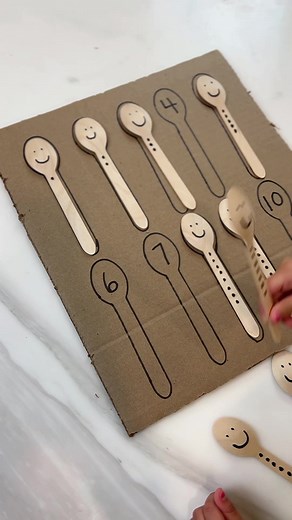 76K views · 1.5K reactions | Teaching my little one numbers has never been more fun and all you need is wooden spoons and cardboard! 燐籠 Save this video so you remember to do it too! And if you are new here, hi  I’m Michelle, check back daily for more fun ideas for kids! #learningnumbers #DIYactivity #parentingwin #kidsactivities #handsonlearning | 7 Days of Play | Facebook