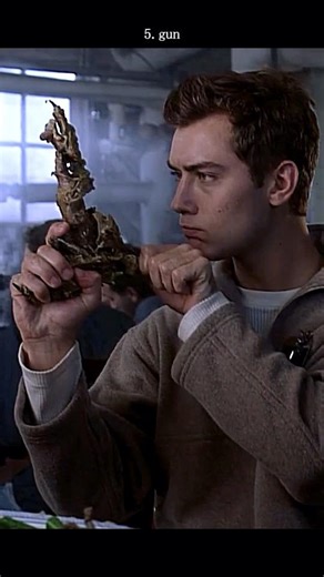 #movie eXistenZ (1999): The Bone Gun Scene Explained – Cronenberg's Weirdest Weapon