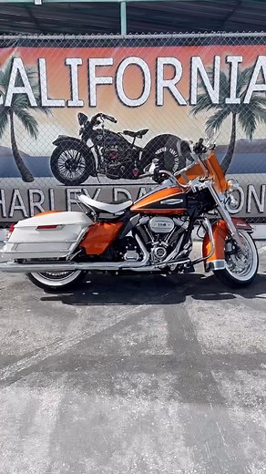 The 2023 Electra Glide Highway King embodies the nostalgia of the cherished two-lane road trip. Inspired by our iconic 1968 FLH Electra Glide, Highway King merges classic styling with modern comfort and performance. Reminiscent of the stunning two-tone options available in 1968, the Electra Glide Highway King is shown here in Hi-Fi Orange accented with Birch White pinstriping and black denim finishing touches. A two-tone coil sprung solo seat combined with a color-matched removable windshield de