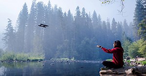 autonomous selfie drone tracks users while freely navigating the environment