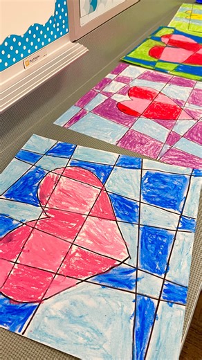 Marine Freibrun, M. Ed. | Educator on Instagram: "Make this simple art project with your students for Valentine’s Day!❤️ Use a 12x12 piece of construction paper. Using a sharpie, draw five lines going down and five lines going across. Make sure they don’t intersect. Then draw a heart in the center. Use warm colors to color the heart and cool colors to color the background. Have students try to alternate the color pattern. I like using oil pastels for this project, but you can use crayons, marker