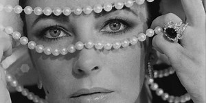 Revisiting Elizabeth Taylor’s Most Iconic On-Screen Jewelry Moments—Including A 50-Carat Royal Pearl