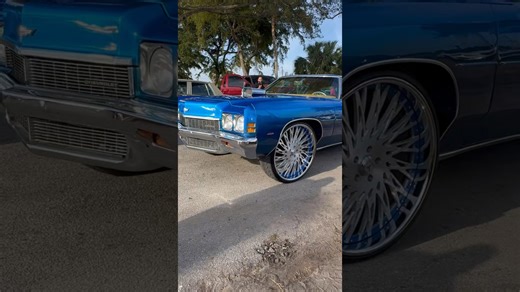 Candy blue 72 Chevy donk on 26’s at the ride-out