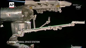 Astronauts prep station for new solar wings