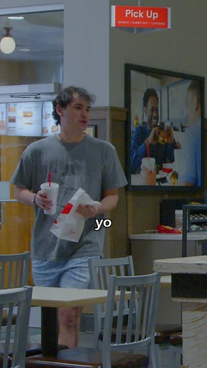 Young Friends Enjoying Fast Food Moments Together