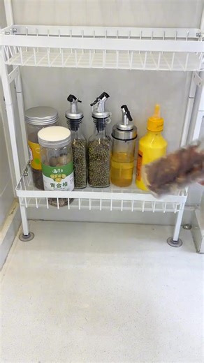 257K views · 1.8K reactions | ️ Organize Like a Pro 狀 Transform your kitchen with the pull-out storage basket — neat, efficient, and stylish for every modern home. #KitchenStorage #HomeOrganization #PullOutBasket #ModernKitchen #smartdesign | Ri when store | Facebook