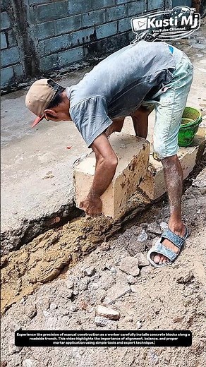 Perfect Edge Alignment by Hand: Satisfying Roadside Block Installation.