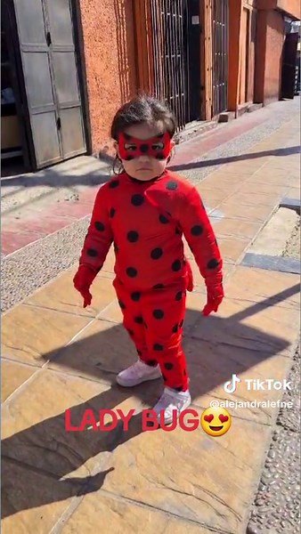Cute Ladybug Costume Play in an Urban Setting