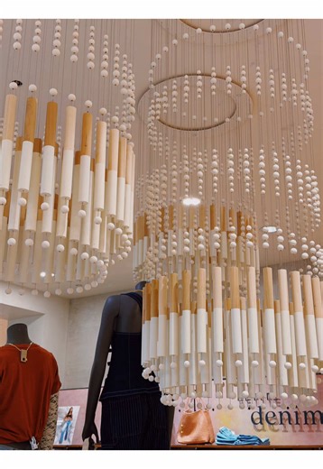 Anthropologie Display: Reused Dowels for New Installation