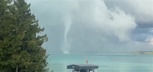 Tornadic waterspout caught on camera on Torch Lake