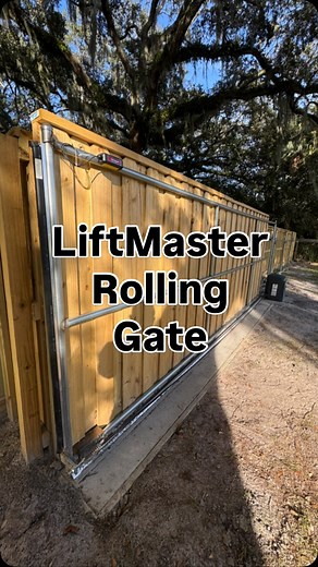 Beautiful 16-foot wide rolling automatic gate, powered by LiftMaster 🔥 Built for smooth operation, daily reliability, and long-term durability. Perfect for driveways, commercial entries, and properties needing secure access control. ▪️Key features include: • Seamless rolling track • Quiet, automatic open & close • Remote access capability • Weather-resistant hardware #fence #fencebuildingcompany #fenceinstallation #fencecontractor #fencecompanynearme #fencecompany #liftmaster #woodfence #vinylf