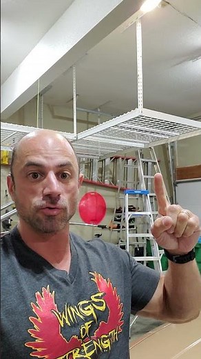 Overhead garage storage racks added to the garage