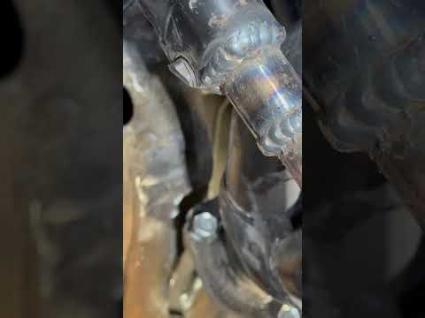 Notched the 46 Chevy frame for the exhaust collector