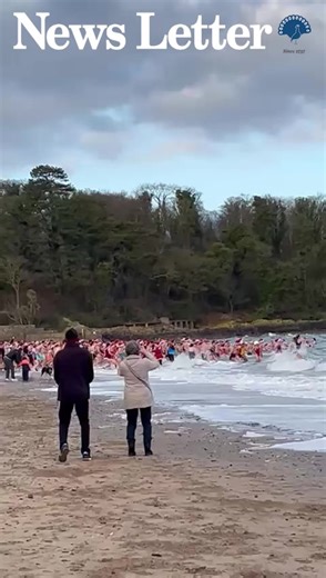 Swimmers plunge into the sea at Helen's Bay beach in Co Down on Christmas Eve 2025. Video taken by Gillian Templeton | News Letter