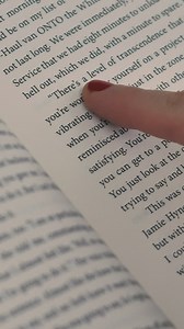 Pages of an open book while a girl reads it - Free Stock Video