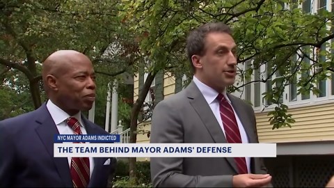 Who is the lawyer behind Adam's defense team?