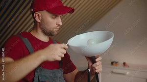 Learn how to repair a lamp with this straightforward tutorial. Step into the workshop as tools are used to fix common issues and restore functionality to your lighting.