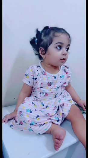 Adorable Toddler in Colorful Mickey Mouse Dress