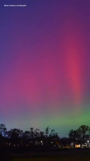 The northern lights lit up the sky across the U.S. from New Hampshire to lowa glowing in wild shades of green, pink, and orange. A once-in-a-lifetime glow, all thanks to space weather. #NorthernLights #AuroraBorealis #Space #astronomy | WeatherBug