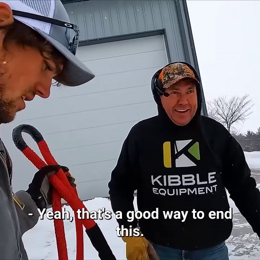 Rescuing a tractor stuck in the snow